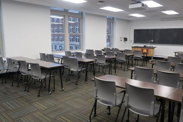 Front of room view with lectern on left in front of chalkboard