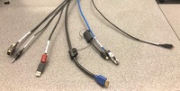 Pedestal - laptop cable connections with cables pulled out showing cable ends