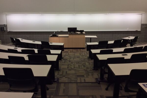  Front of room view with lectern center in front of markerboard 