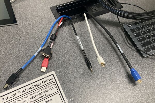 Pedestal - laptop cable connections with cables pulled out showing cable ends