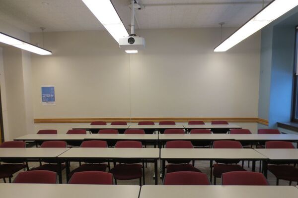 Rear of room view of student table and chair seating